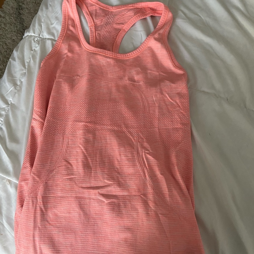 Lululemon tank top RARE COLOR 2 small holes